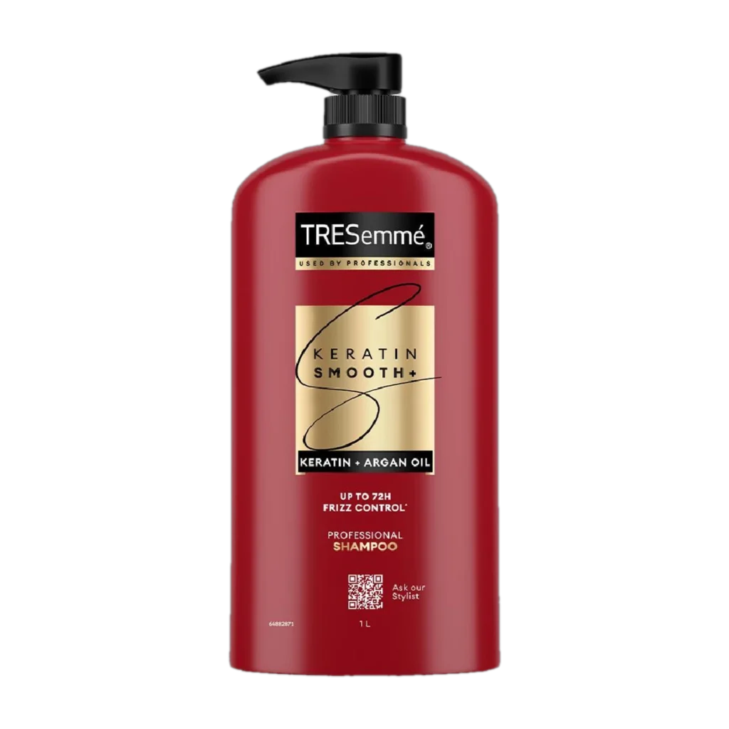 A red bottle of TRESemmé Keratin Smooth Shampoo, often considered the best shampoo for women seeking affordable frizz control and smooth hair.